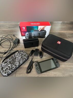 Nintendo Switch v1 console Gray Joy-Con with 2 travel cases